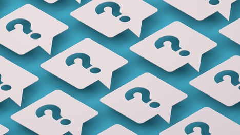 several speech bubbles with question marks